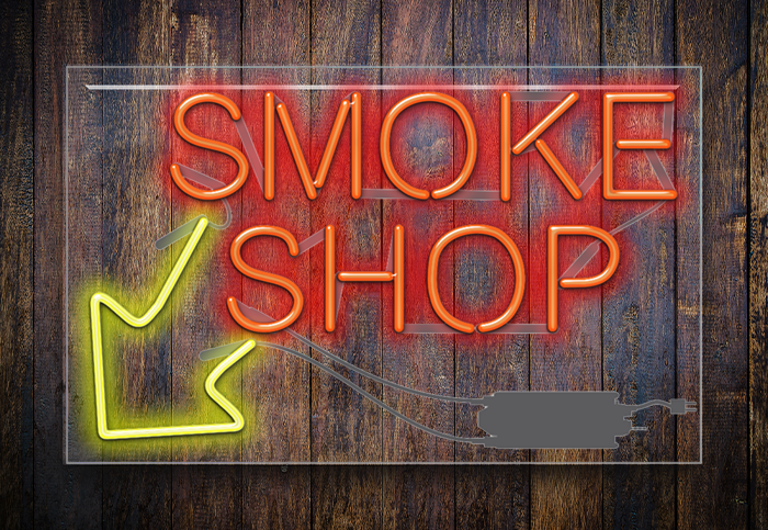 Smoke Shop with Left Arrow Neon Sign