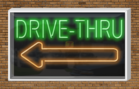 Outdoor Drive-Thru with Left Arrow Neon Sign